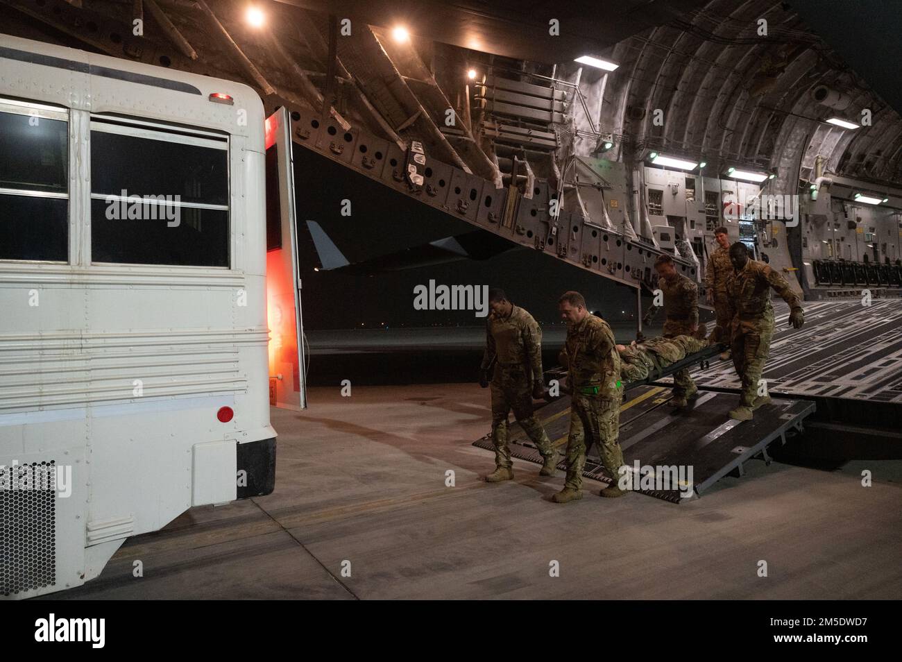U.S. Airmen assigned to the 379th Expeditionary Aeromedical Evacuation ...