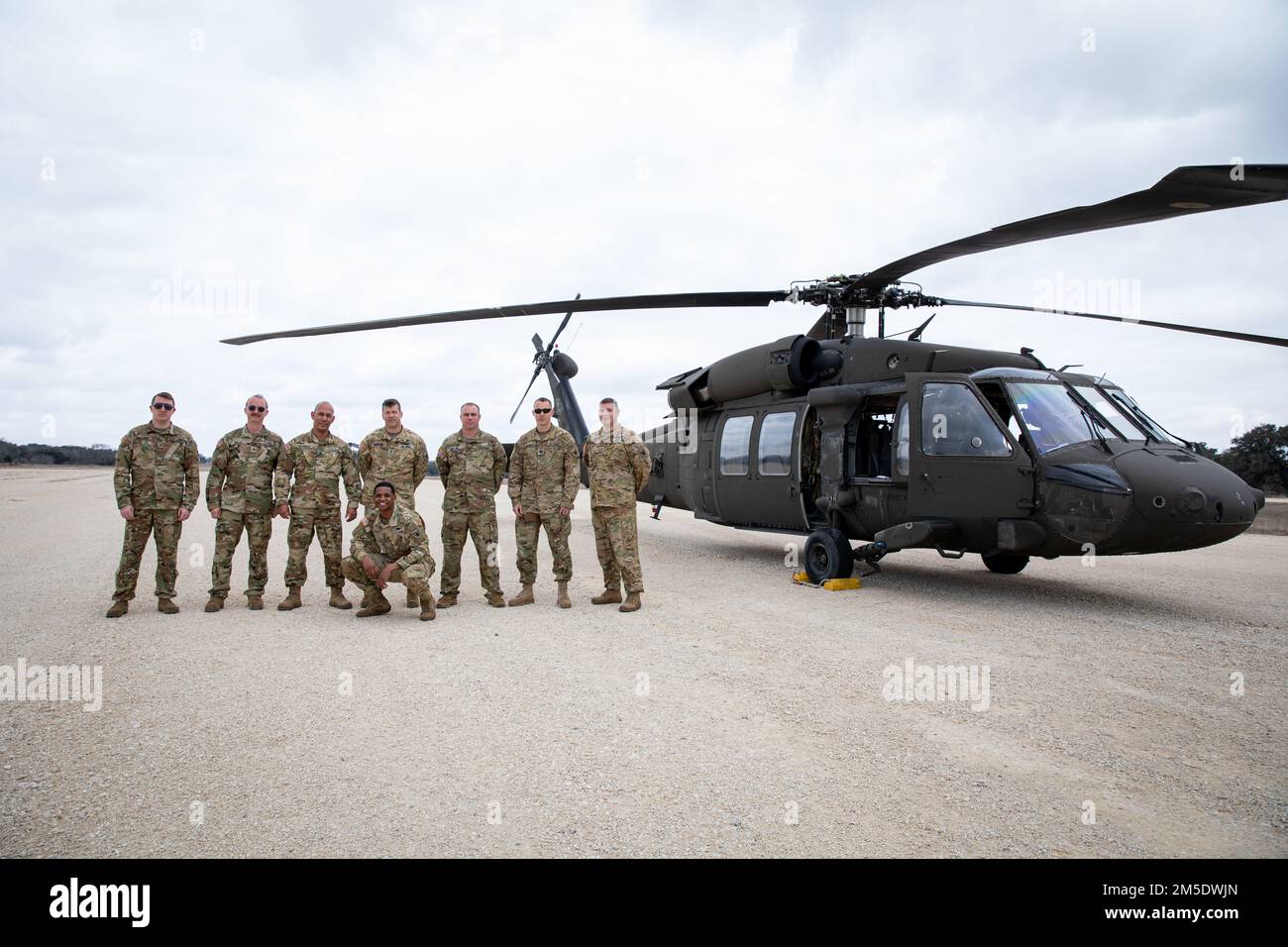 U.S. Army Reserve cadre pose for a photo in front of a UH60 Black Hawk