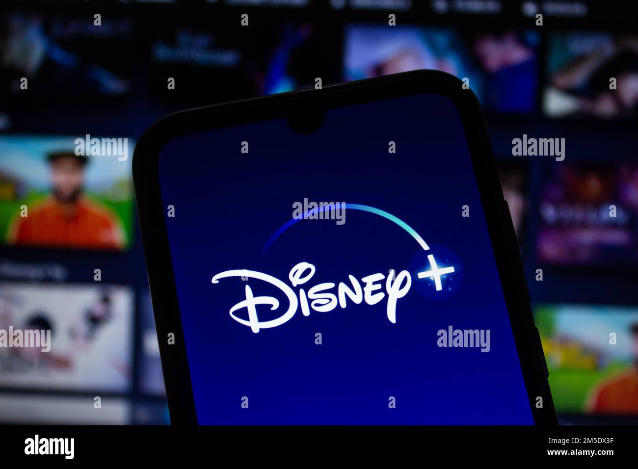 Smartphone with Disney+ logo displayed on the screen. Afyonkarahisar, Turkey - December 23, 2022. Stock Photo