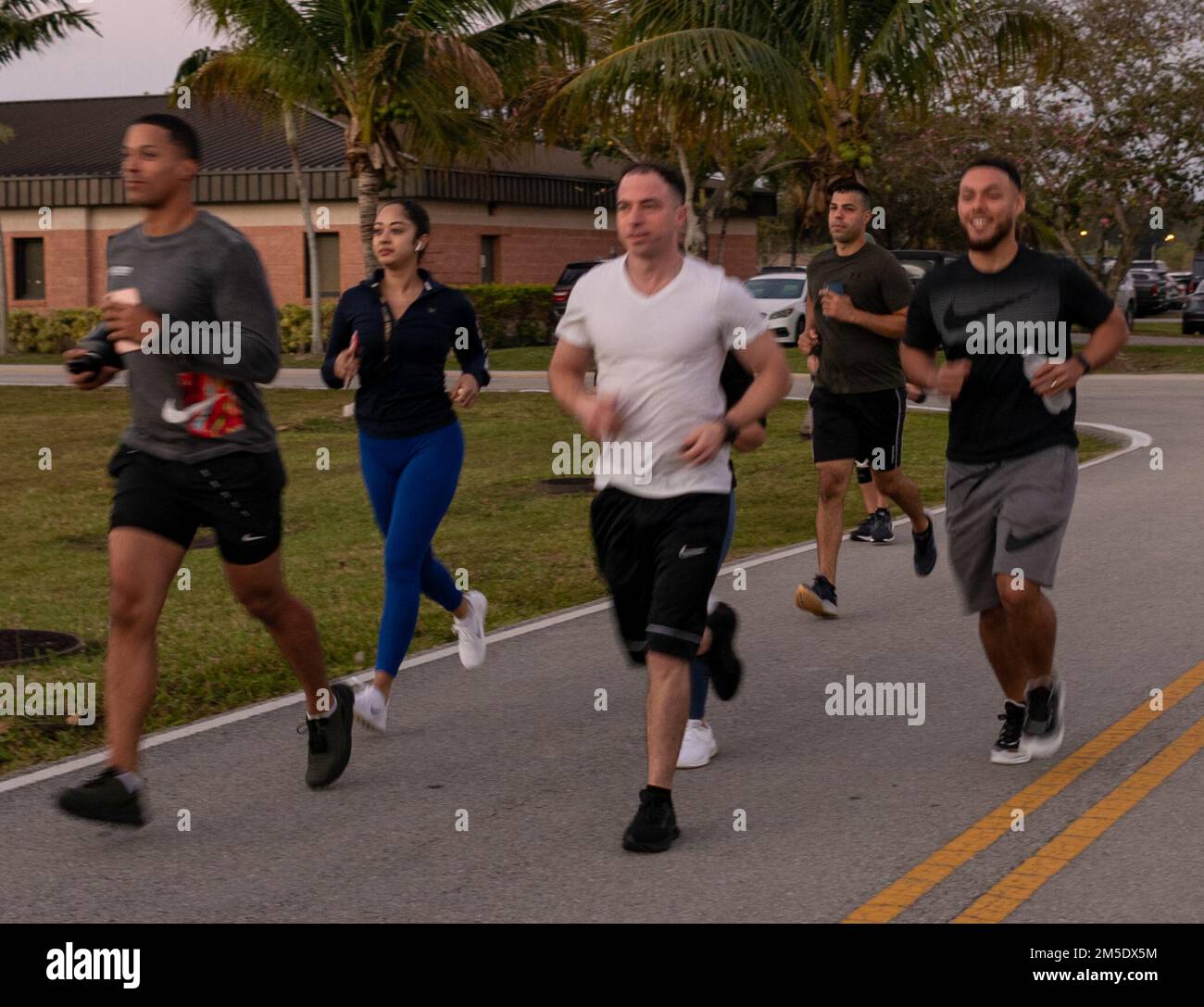 Members of the 482nd Fighter Wing run together in a memorial 5k, in honor of Master Sgt Frederrick Dawson, Security Forces Squadron, on the anniversary of his passing. Stock Photo