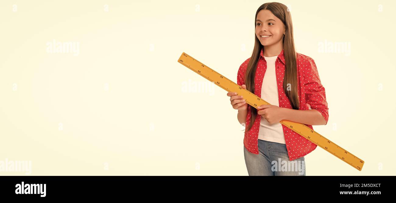 Pupil Using Ruler mathematics. positive teen girl hold ruler. back to school. algebra and ...