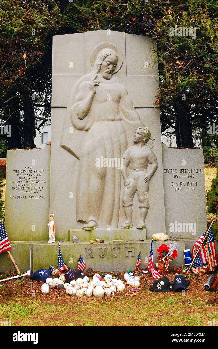 The grave of baseball great Babe Ruth is decorated with baseball themed offerings from fans of the hall of fame New York Yankee Stock Photo