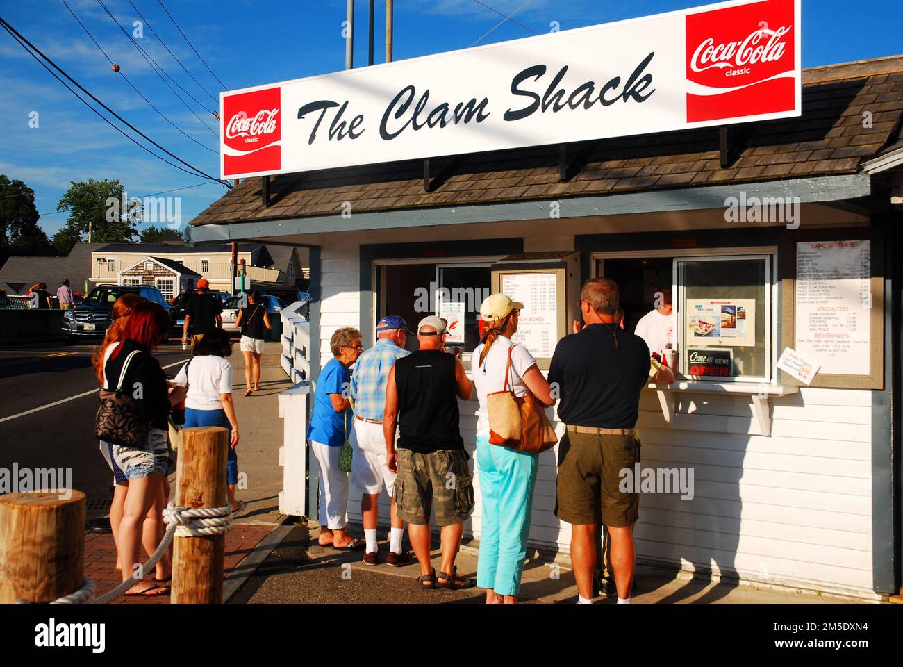 A small crowd seeks the freshest seafood at a clam shack on the Maine coast Stock Photo