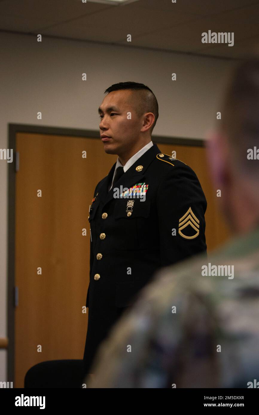 A U.S. Army Soldier with the Washington National Guard appears before a command sergeants major board panel during the state Best Warrior Competition at Joint Base Lewis-McChord, Wash, March 5, 2022. In addition to the board panel, the competition consisted of an Army Combat Fitness Test, written essay, qualification range, stress shoot, land navigation, and tactical ruck march. The winning Soldier and NCO—Spc. Eric Smith with 2nd Battalion, 146th Field Artillery, and Staff Sgt. Stormy White with Recruiting and Retention Battalion—will go on to represent Washington in the Region VI Army Nation Stock Photo