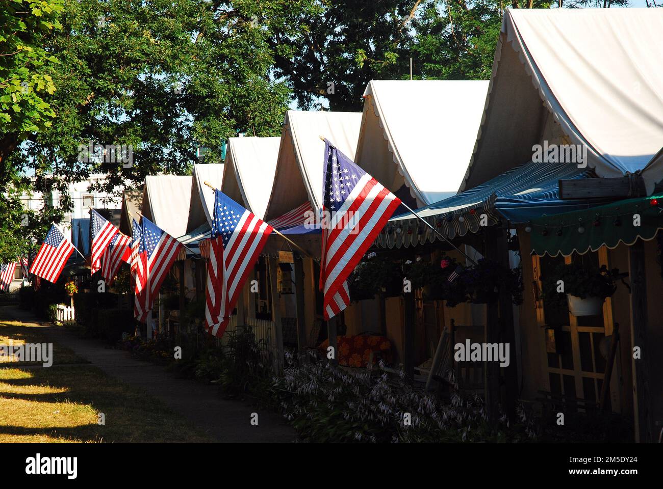 American flags hang on the Fourth of July of bungalows, also known as Tent City or Tent Community in Ocean Grove on the Jersey Shore Stock Photo