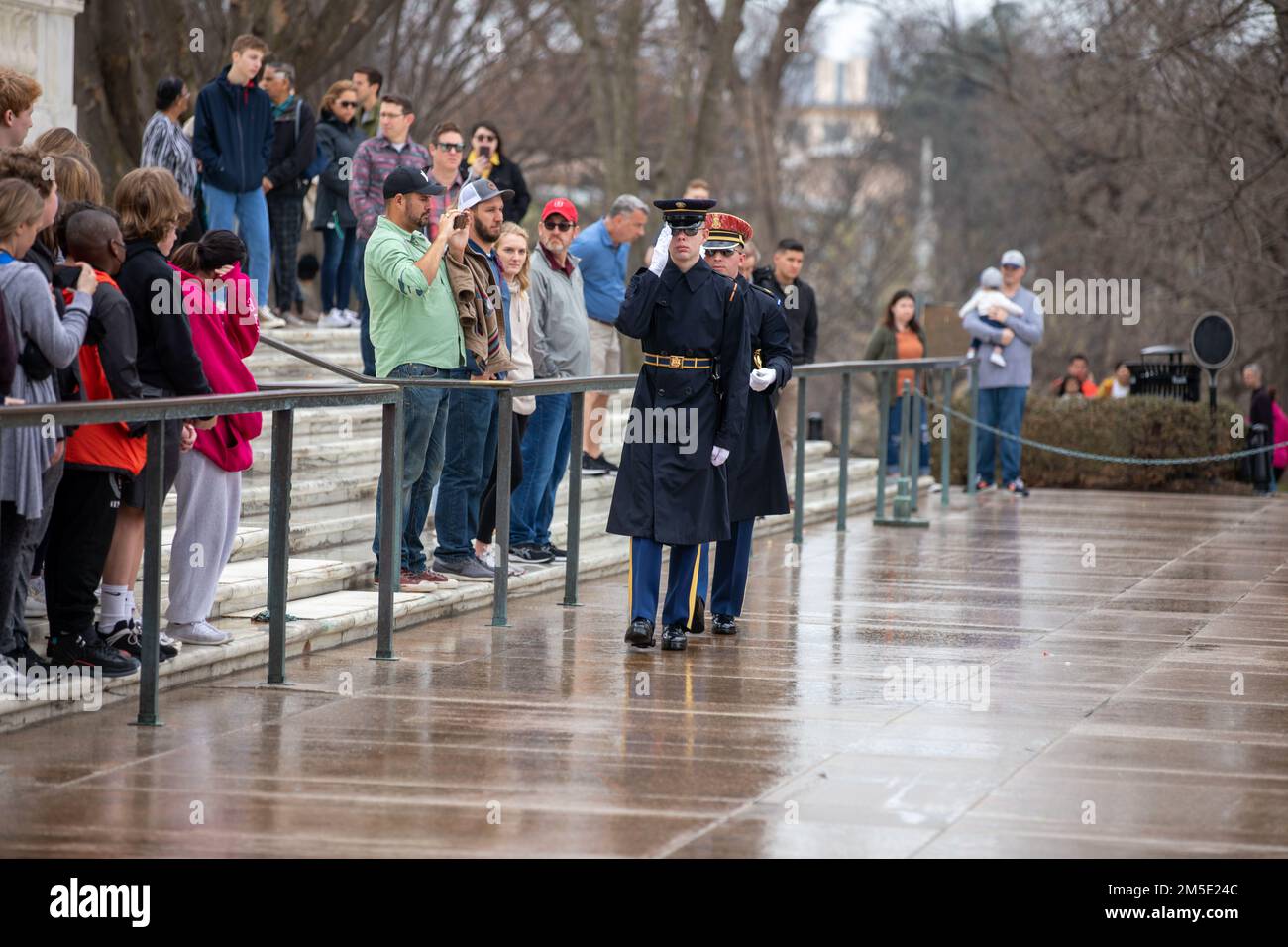 U.S. Army Honor Guard, 3rd Infantry Division, conduct a ceremonial wreath laying at the Tomb of the Unknown Soldier in Arlington, Virginia, Mar. 6, 2022. U.S. Army Soldiers from the Vermont National Guard traveled to the Arlington National Cemetery to pay respects. Stock Photo