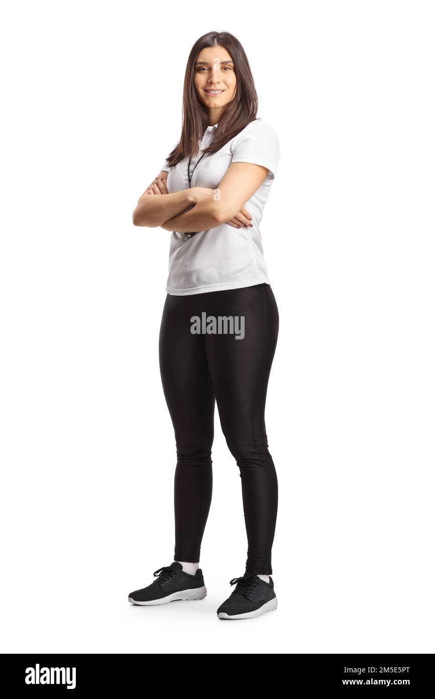 Full length portrait of a female sport coach posing isolated on white