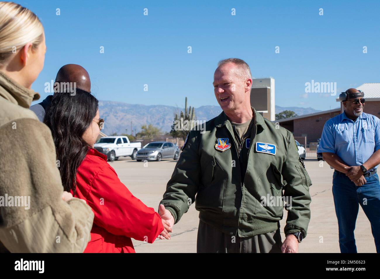 U.S. Air Force Gen. Mark Kelly, commander of Air Combat Command, greets the 355th Wing Protocol team during Heritage Flight Training Course at Davis-Monthan Air Force Base, Arizona, March 6, 2022. Kelly certified ACC’s Heritage Flight Training Course hosted at Davis-Monthan Air Force Base, Arizona, from March 2-6. Stock Photo