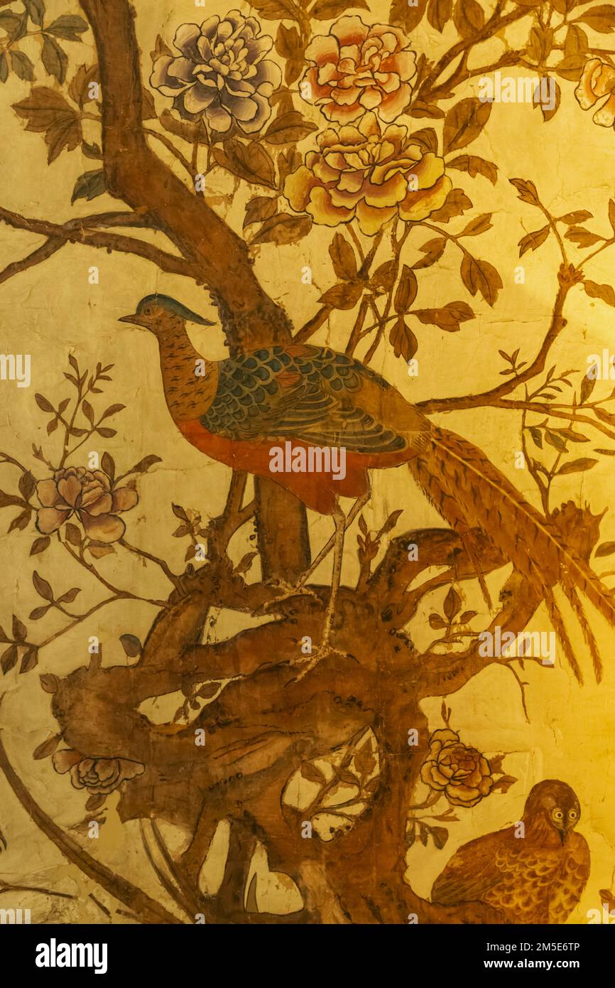 England, Kent, Sevenoaks, Ightham Mote, 14th century Moated Manor House, The Drawing Room, Detail of The 18th century Hand-painted Chinese Wallpaper d Stock Photo