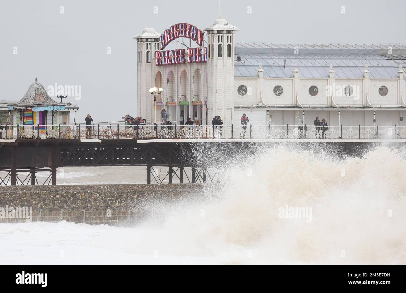 Brighton, UK. 28th Dec, 2022. Waves crashing onto Brighton beach as the high winds and rain continue to batter the South Coast. Credit: James Boardman/Alamy Live News Stock Photo