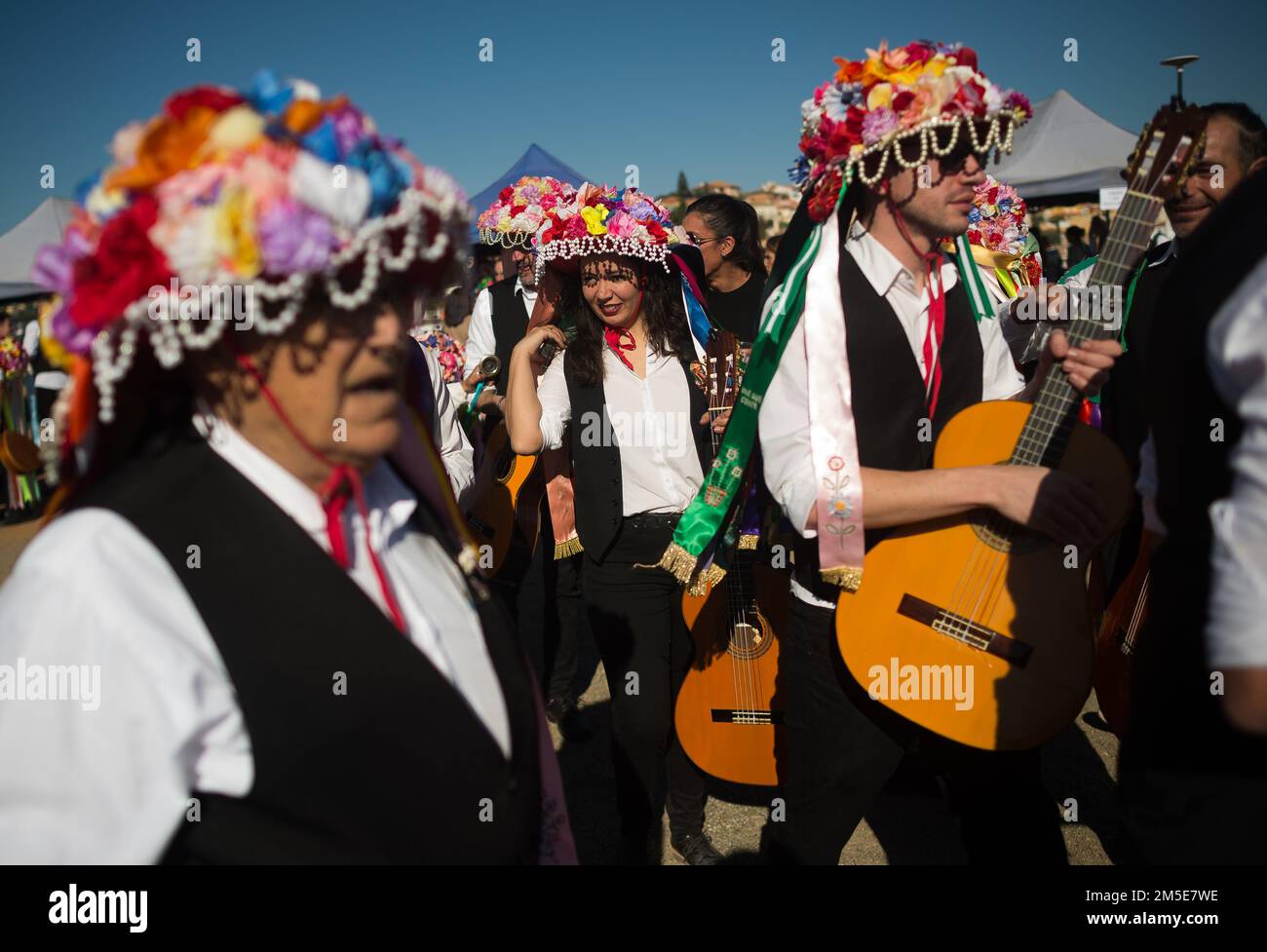 Participants dressed in traditional costumes are seen before taking part in the festival. The 60th edition of the Verdiales Flamenco Dance contest, an important cultural and music festival, is celebrated annually on Fools Saints Day. Musicians from different musical groups known as 'pandas' compete in a contest which includes singing and dancing in a flamenco style called 'Verdiales'. The musicians use traditional Andalusian instruments and costumes. Stock Photo