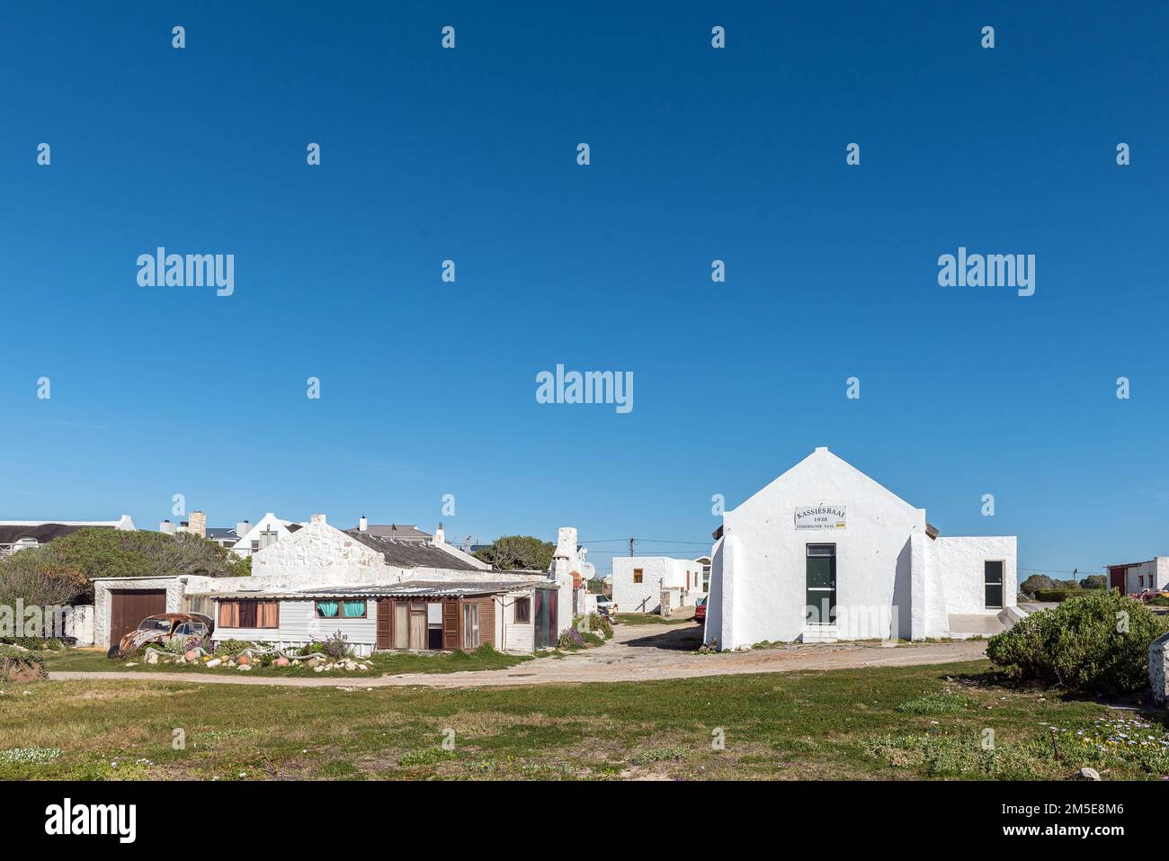 Arniston, South Africa - Sep 22, 2022: A house, car wreck and the hall ...