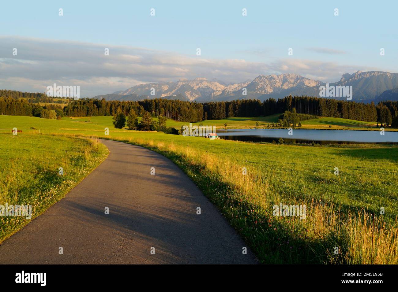 scenic alpine lake Attlesee and the lush alpine valley with its endless