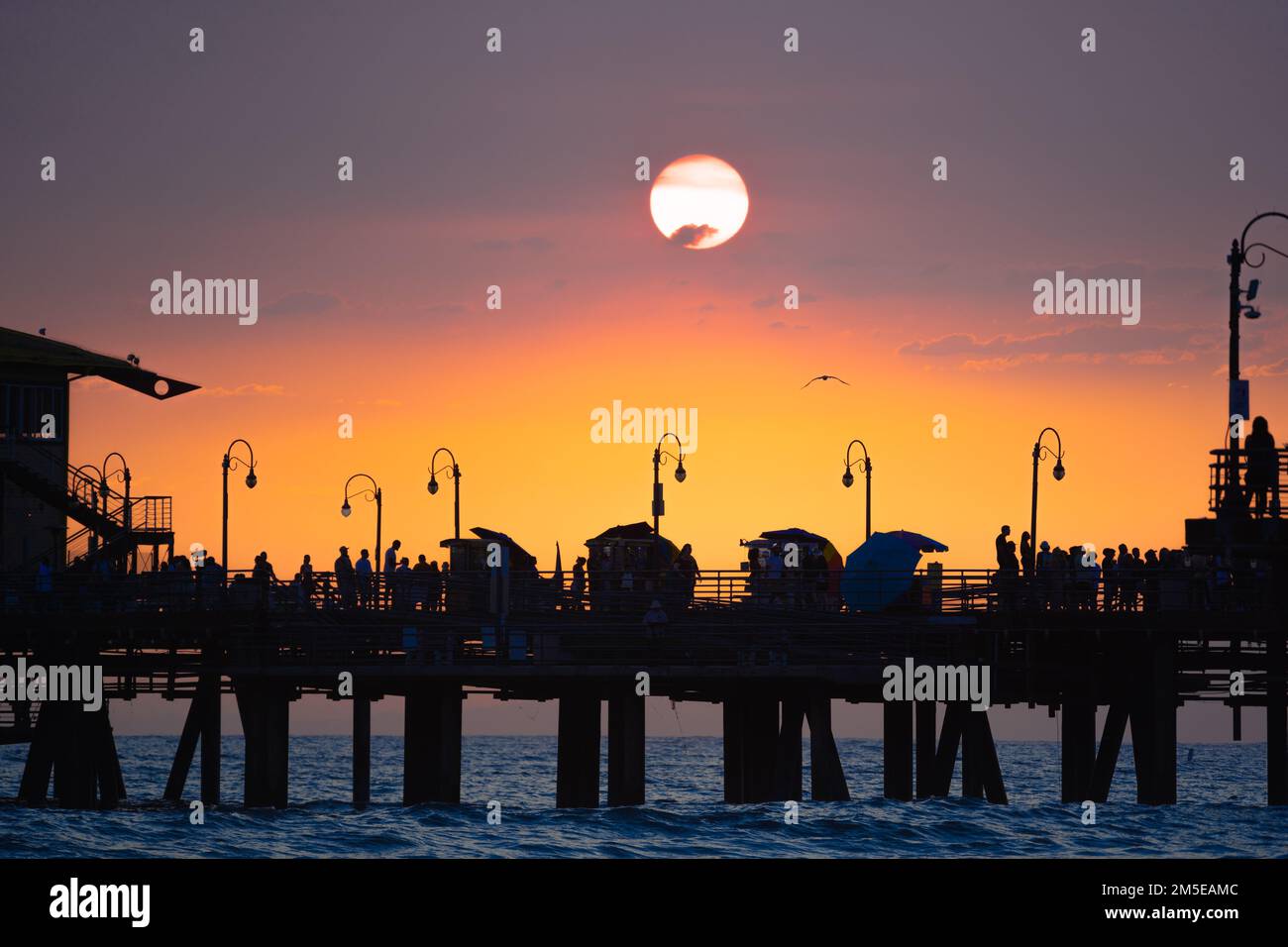 silhouette of a santa monica pier at sunset Stock Photo