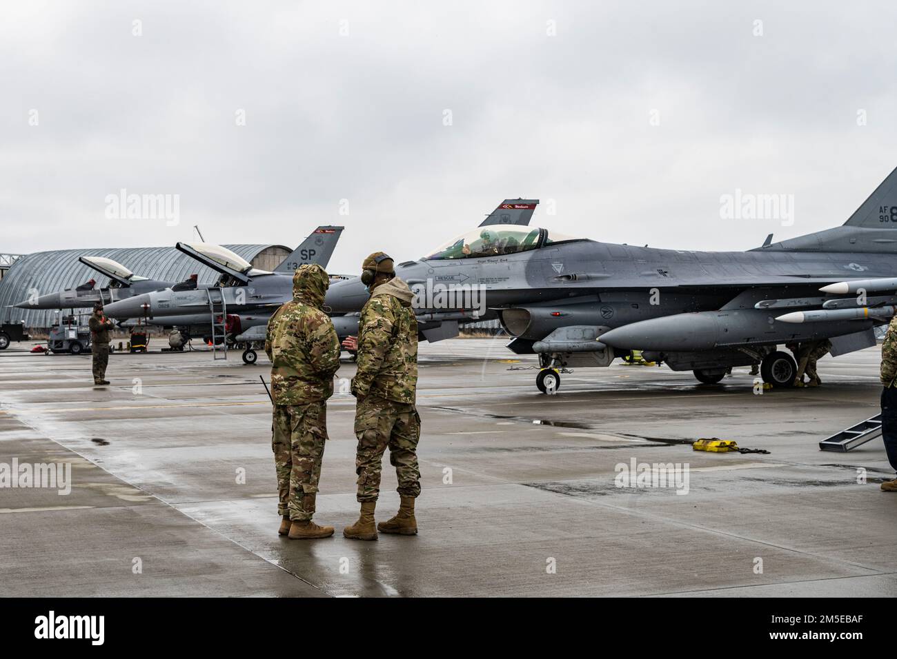Two U.S. Air Force F-16 Fighting Falcon aircraft maintainers from the ...