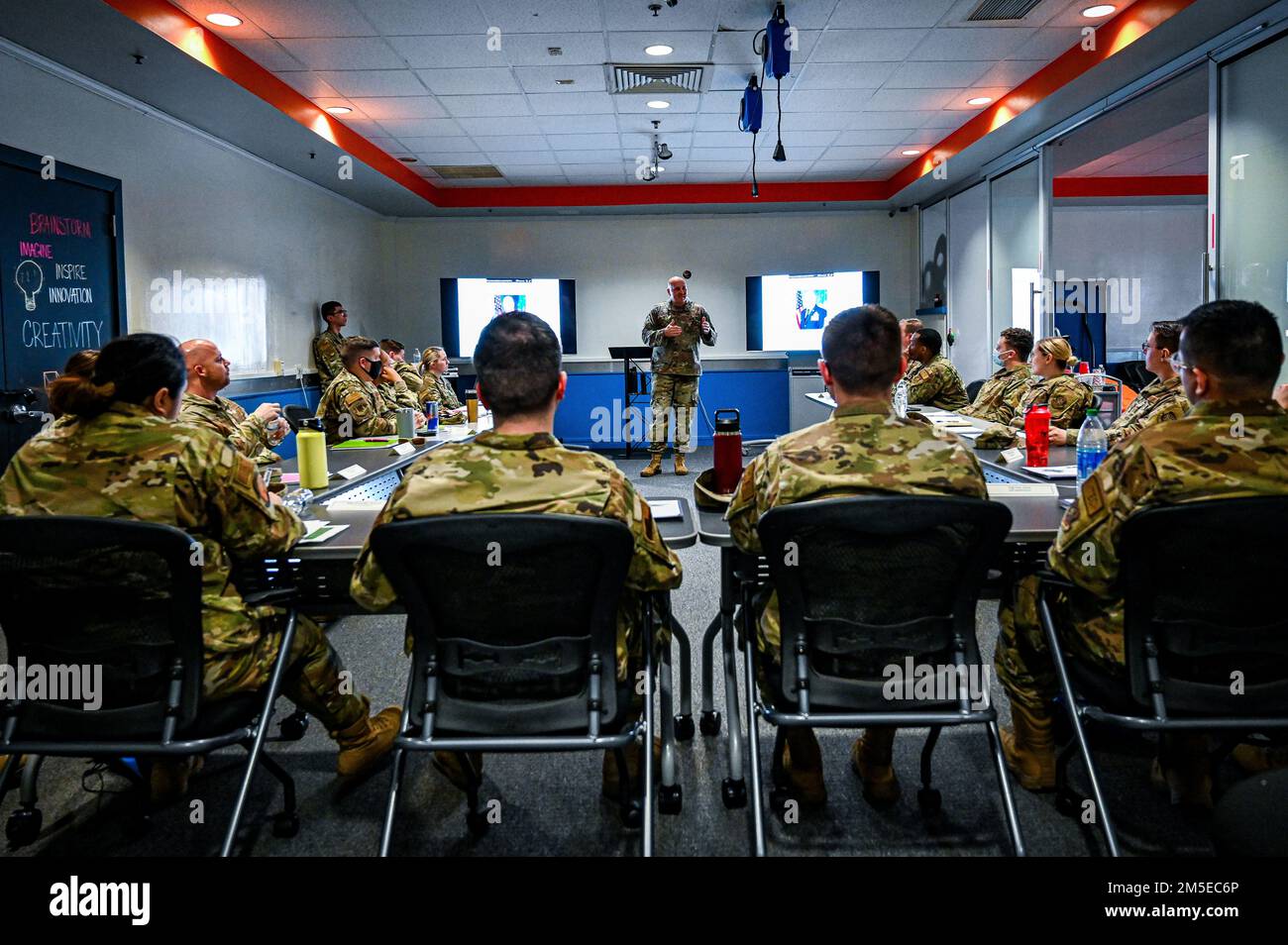 U.S. Air Force noncommissioned officers assigned to Joint Base McGuire-Dix-  Lakehurst are lectured by Chief Master Sgt. Anthony Green, U.S. Air Force  Expeditionary Center, command chief, during Airpower Leadership Academy (ALA) on 7  March, 2022, at the Infinity Spark Innovation Lab on Joint Base McGuire-Dix-Lakehurst,  N.J. The ALA is a 305th Air Mobility Wing initiative created to supplement the leadership  training offered to noncommissioned officers on the joint base. The weeklong course  uses the U.S. Air Force Enlisted Force Development Action Plan as a framework to  accelerate the gro Stock Photo