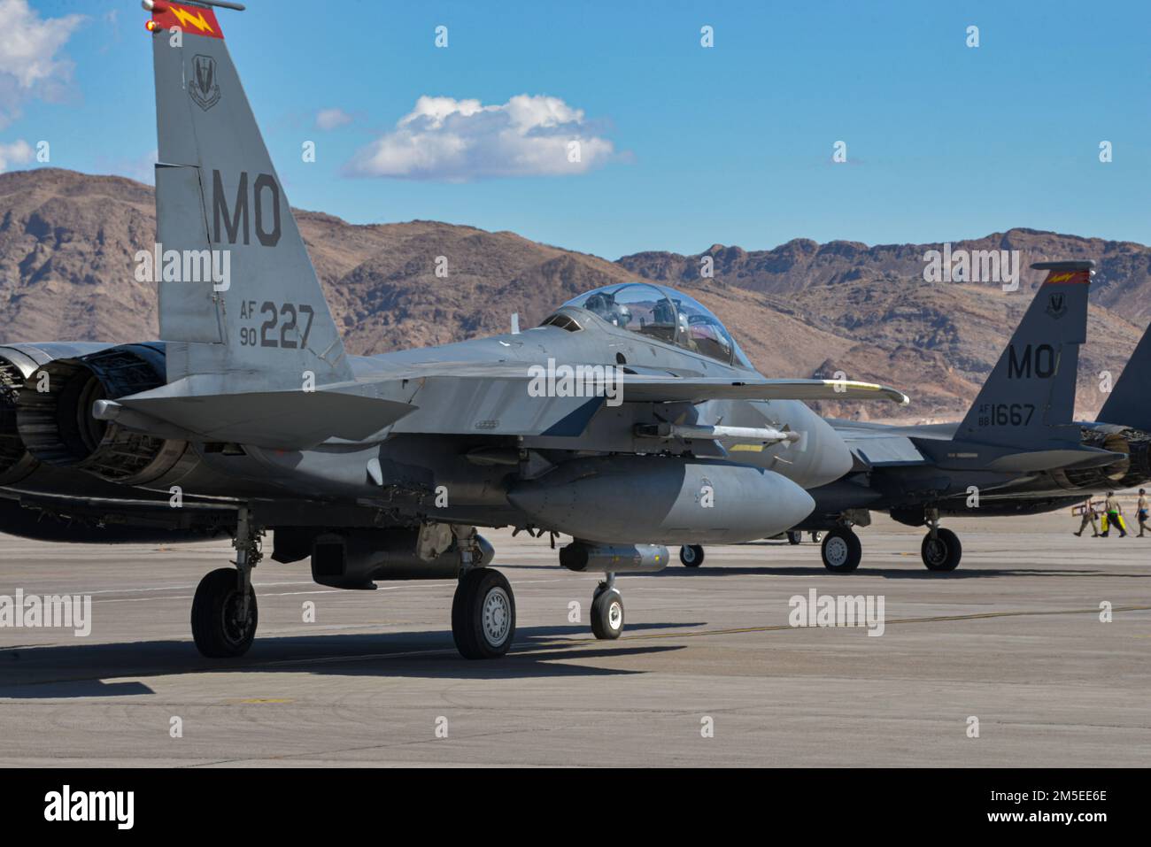 U.S. Air Force F-15E Strike Eagles from the 389th Fighter Squadron, Mountain Home Air Force Base, Idaho, taxi for takeoff as part of Red Flag-Nellis 22-2 on Nellis Air Force Base, Nevada, March 7, 2022. Red Flag provides several realistic training scenarios that saves lives while increasing combat effectiveness. Stock Photo