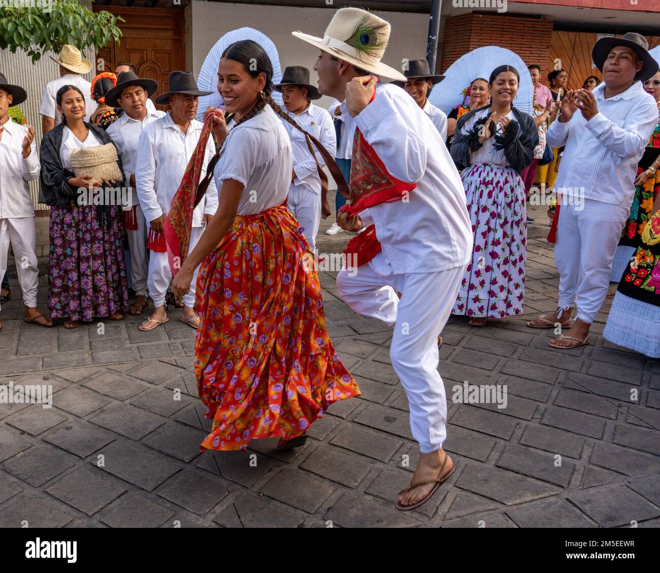 Dancers in traditional dress from Miahuatlan dance the Mixtec Jarabe at the Guelaguetza dance festival in Oaxaca, Mexico. Stock Photo