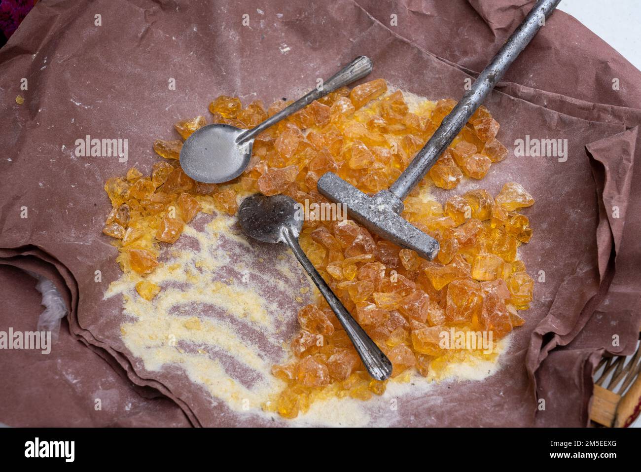 Pieces of golden copal incense for sale in a street market for celebrating Day of the Dead or Dia de los Muertos in Oaxaca, Mexico. Stock Photo