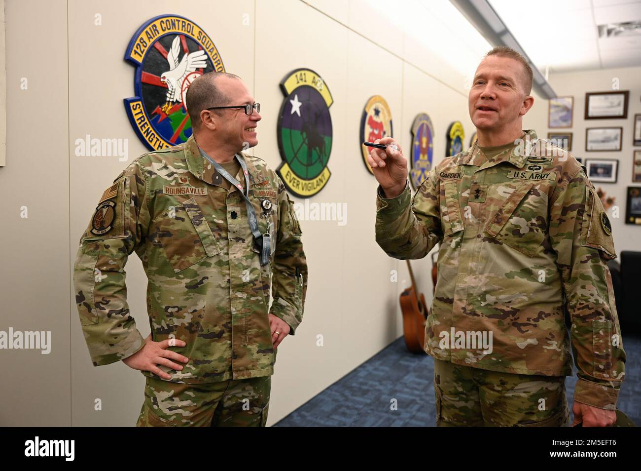 From left, U.S. Air Force Lt. Col. Wesley Rounsaville, 727th Expeditionary Air Control Squadron commander, and U.S. Army Maj. Gen. Thomas Carden, Georgia National Guard adjutant general, during an immersion tour at Shaw Air Force Base, South Carolina, March 7, 2022. Immersion tours enable total force integration throughout AFCENT’s various mission sets and combat operations. (U.S. Air Force Staff Sgt. Blake Gonzales) Stock Photo