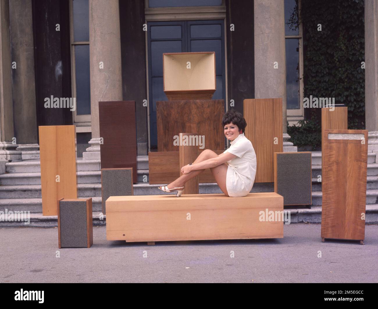 A female model poses amongst vinate large speakers c1970. Photo by Gilbert Adams    From The Gilbert Adams Collection - wholly owned by Tony Henshaw Stock Photo