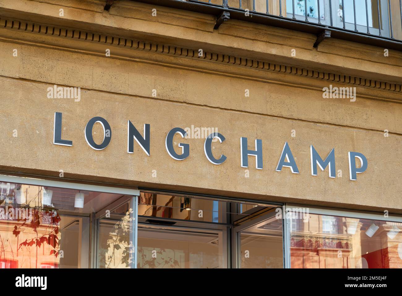 Longchamp logo of Aix-en-provence store, France. A famous French leather goods company. Stock Photo