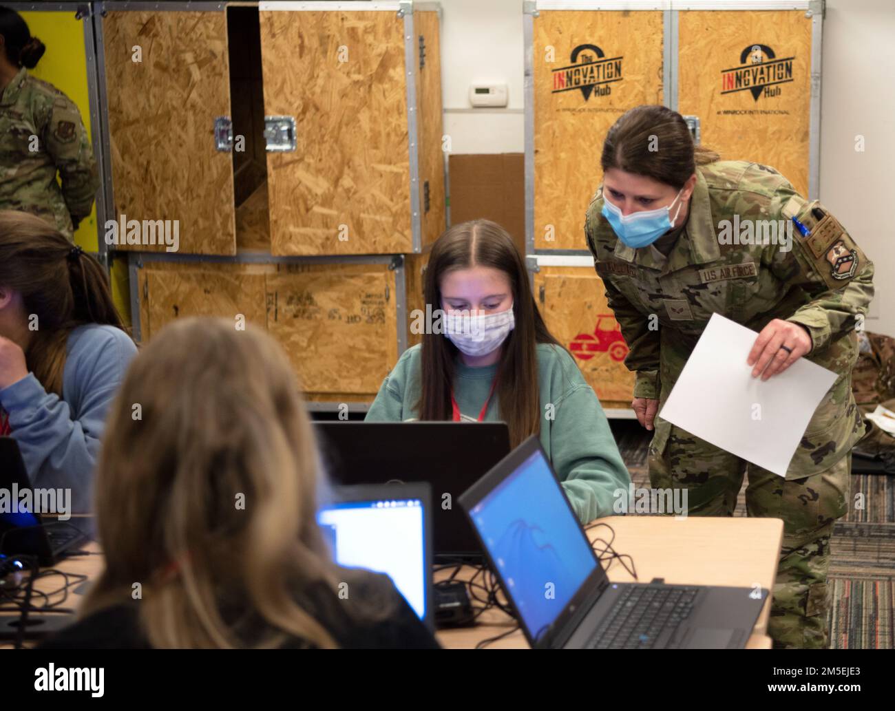 THE ARKANSAS REGIONAL INNOVATION HUB, North Little Rock, Ark. - Members of the 233rd Cyber Operations Squadron, 189th Airlift Wing, teamed up with the Regional Innovation Hub in North Little Rock on March 8 to encourage young women to join STEM focused career fields.    The team of Arkansas Airmen, led by Capt. T. J. Van Doyle, focused on cyber security as they interacted with local teens from the community.    (Arkansas National Guard photos by Lt. Col. W. B. Phillips, II/Released) Stock Photo