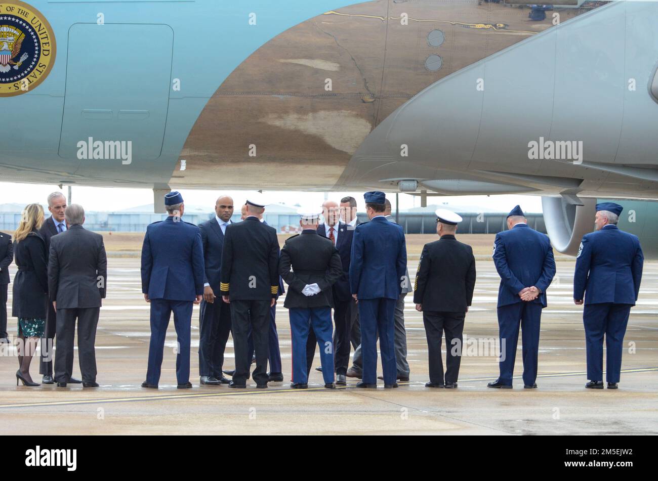 U.S. Representatives Marc Veasey, Colin Allred and Jake Ellzey pause to chat with various key leadership from the Navy, Marines, 10th Air Force and the 136th Airlift Wing, Texas Air National Guard during a presidential stopover of Air Force One. President of the United States Joe Biden arrived at NAS JRB Fort Worth during a visit to Fort Worth addressing veteran care. Stock Photo