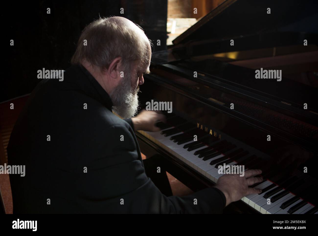 British composer and musician Robert John Godfrey plays his Yamaha