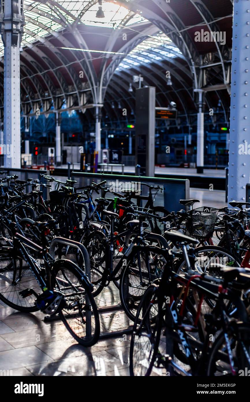 Dozens of cycles locked up on the platform on a strike day on an empty platform at Paddington station. Stock Photo