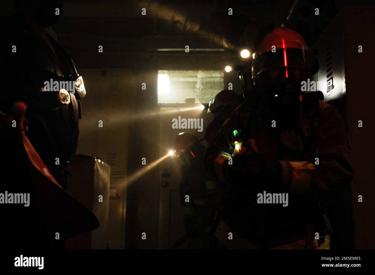 POLARIS POINT, Guam (March 8, 2022) Firefighters participate in a