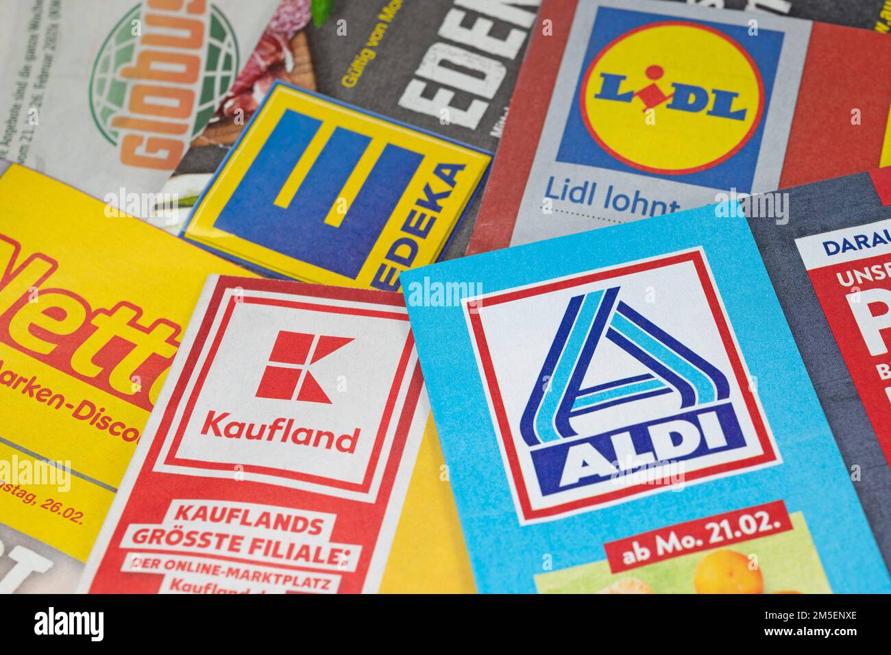 Various advertising brochures for discounters in retail in Germany that appear weekly Stock Photo