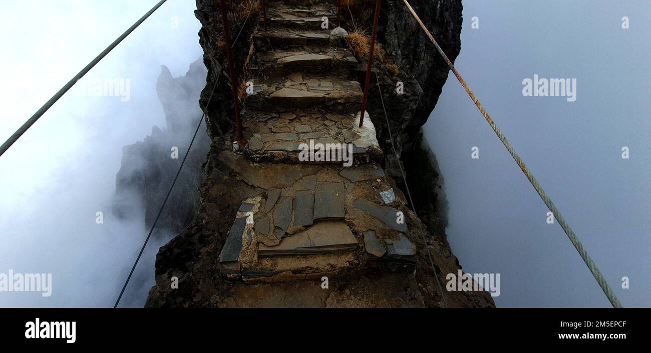 A panoramic view of a trail in a mountain peak in Madeira, Portugal