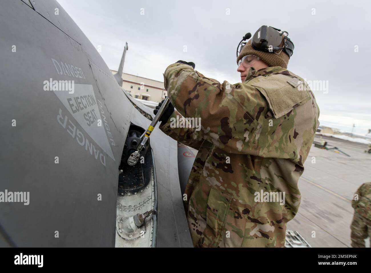 U.S. Air Force Senior Airman Hunter Duby, an aircraft armament systems specialist assigned to the Ohio National Guard’s 180th Fighter Wing, conducts an inspection of an M61A1 Vulcan Cannon on an F-16 Fighting Falcon, assigned to the 180FW, at Joint Base Elmendorf-Richardson, Alaska, during U.S. Northern Command Exercise ARCTIC EDGE 2022, March 8, 2022. AE22 is a biennial homeland defense exercise designed for U.S. and Canadian Armed Forces to demonstrate and exercise a joint capability to rapidly deploy and operate in the Arctic. Stock Photo