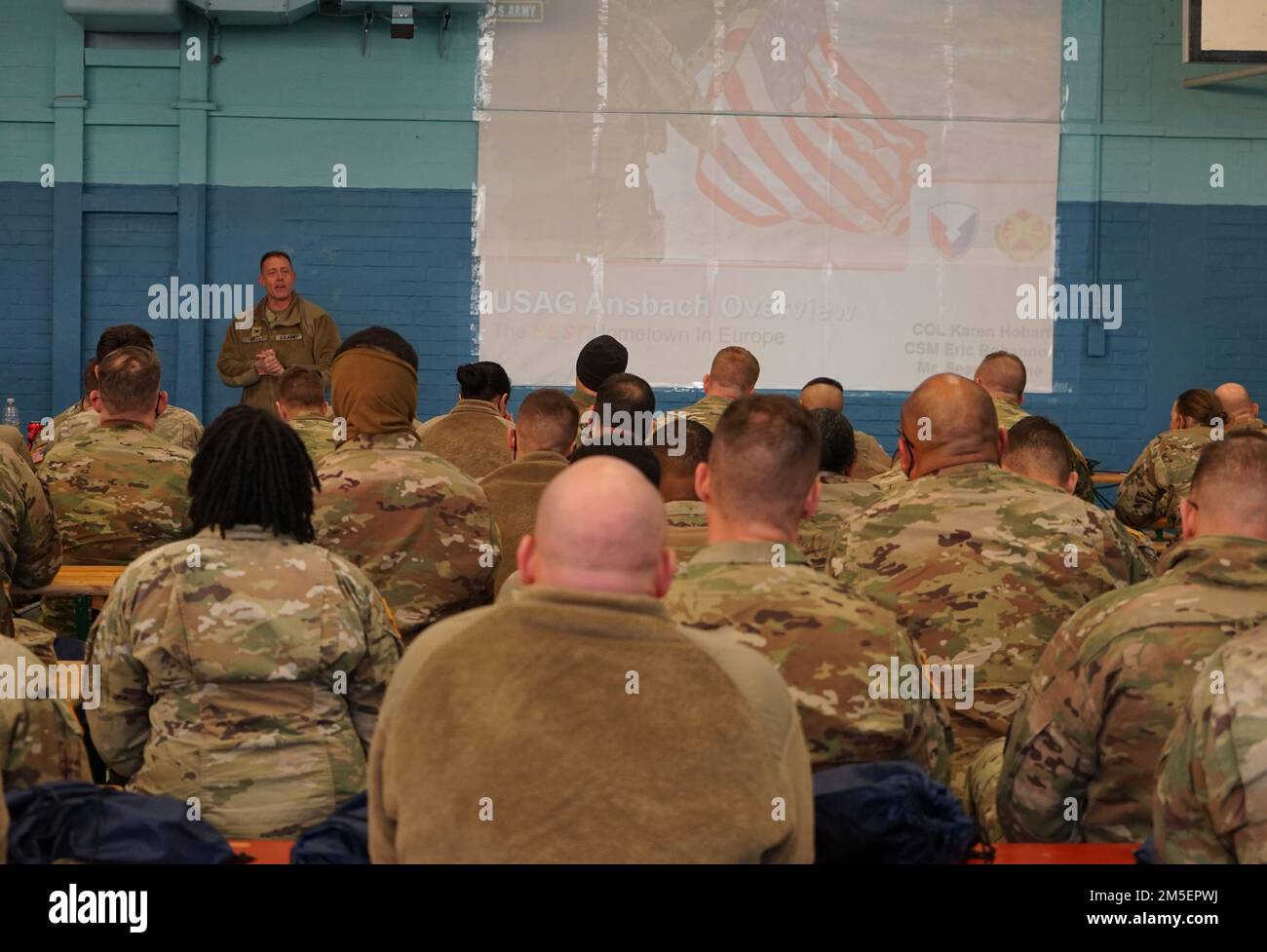 Col. Thomas Galli, V Corps, Fort Knox, Ky., talks with Soldiers during inprocessing on Barton Barracks, Ansbach, Germany, March 8, 2022, as part of a deployment to Germany to build readiness, improve interoperability, reinforce allies and deter further Russian aggression. The deployment of U.S. forces here is a prudent measure that underpins NATO’s collective war-prevention aims, defensive orientation and commitment to protect all Allies. Stock Photo