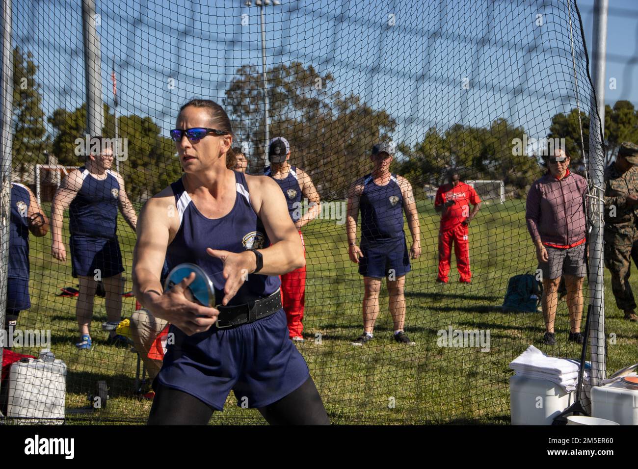 Retired U.S. Marine Corps Maj. Lisa Doring prepares to throw a discus at Page field house during the 2020 West Coast Marine Corps Trials (MCT) track and field event on Marine Corps Base Camp Pendleton, California, March 8, 2022. The MCT is an adaptive sports event involving more than 75 wounded, ill, or injured Marines, Sailors, veterans, and international competitors. Stock Photo