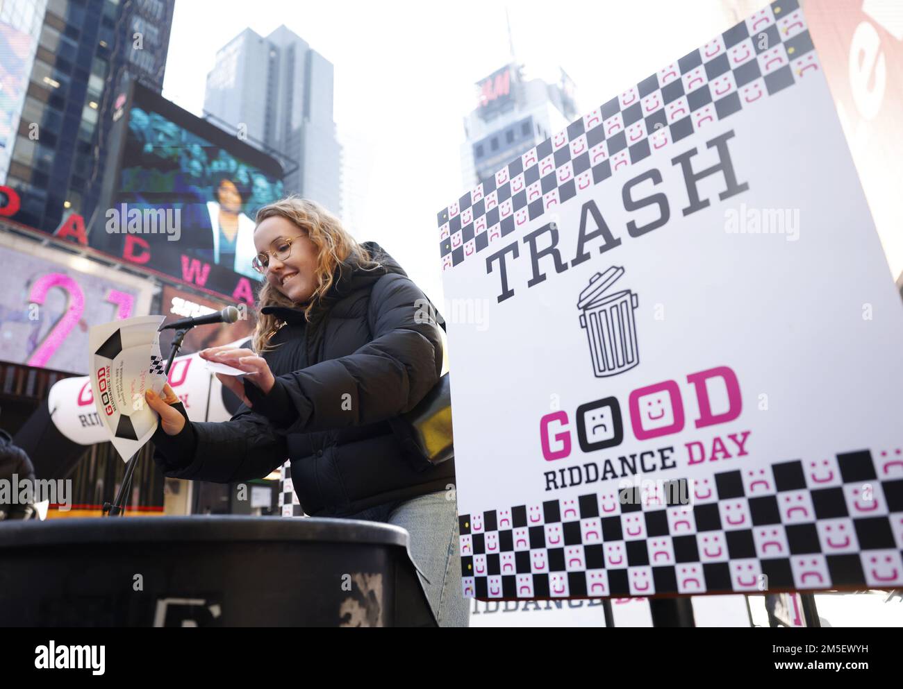 New York, United States. 27th Dec, 2022. A participant destroys a document and throws it into the trash in Times Square to overcome obstacles and bad memories from 2022 at 16th Annual Good Riddance Day as part of the Times Square events leading up to New Year's Eve in New York City on Wednesday, December 28, 2022. Photo by John Angelillo/UPI Credit: UPI/Alamy Live News Stock Photo