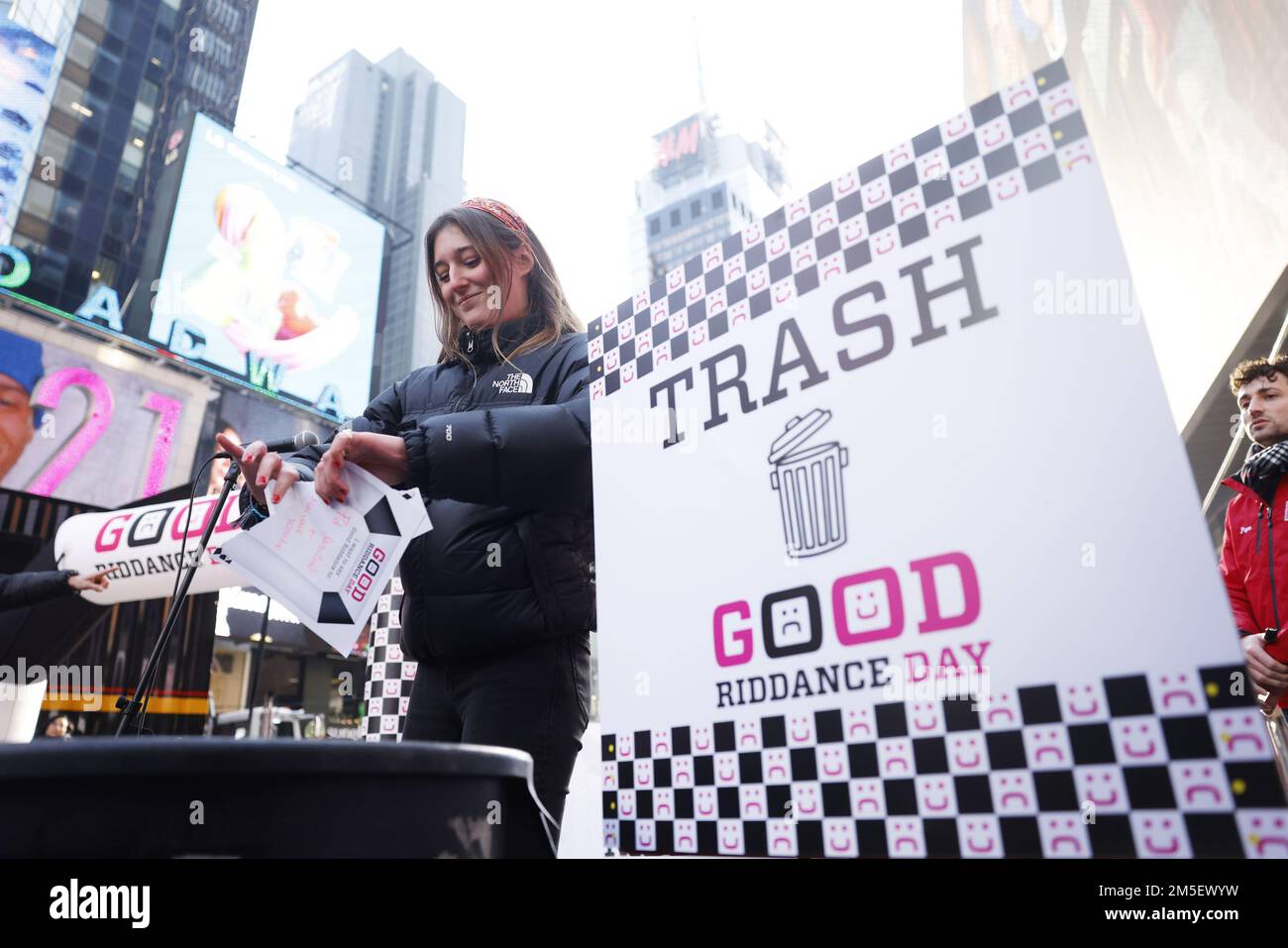New York, United States. 27th Dec, 2022. A participant destroys a document and throws it into the trash in Times Square to overcome obstacles and bad memories from 2022 at 16th Annual Good Riddance Day as part of the Times Square events leading up to New Year's Eve in New York City on Wednesday, December 28, 2022. Photo by John Angelillo/UPI Credit: UPI/Alamy Live News Stock Photo