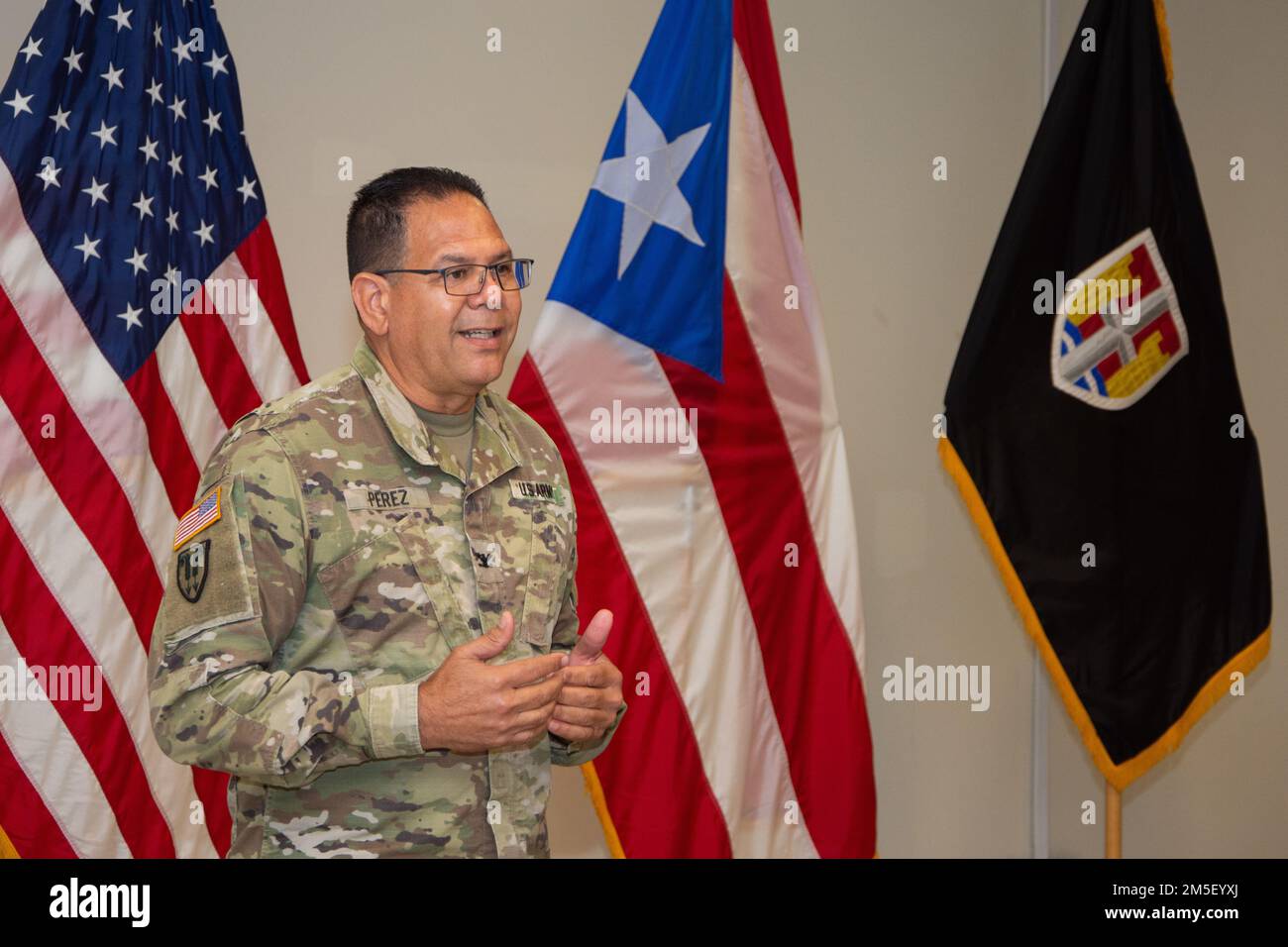 Col. Victor Pérez addresses those present during the promotion ceremony of Maj. Luis E. Medina at Fort Buchanan, Puerto Rico, March 9, 2022. The Puerto Rico Army National Guard requires capable and effective officers to lead and instruct our soldiers in the day-to-day operations. Stock Photo
