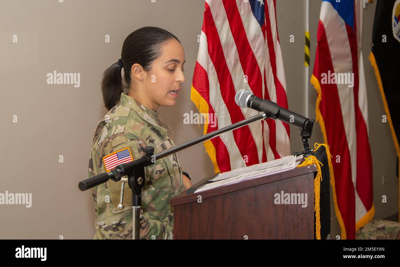 2nd Lt. Karla Torres, master of ceremonies, speaks about Cpt. Luis E. Medina's leadership during the promotion ceremony at Fort Buchanan, Puerto Rico, March 9, 2022. The Puerto Rico Army National Guard requires capable and effective officers to lead and instruct our soldiers in the day-to-day operations. Stock Photo