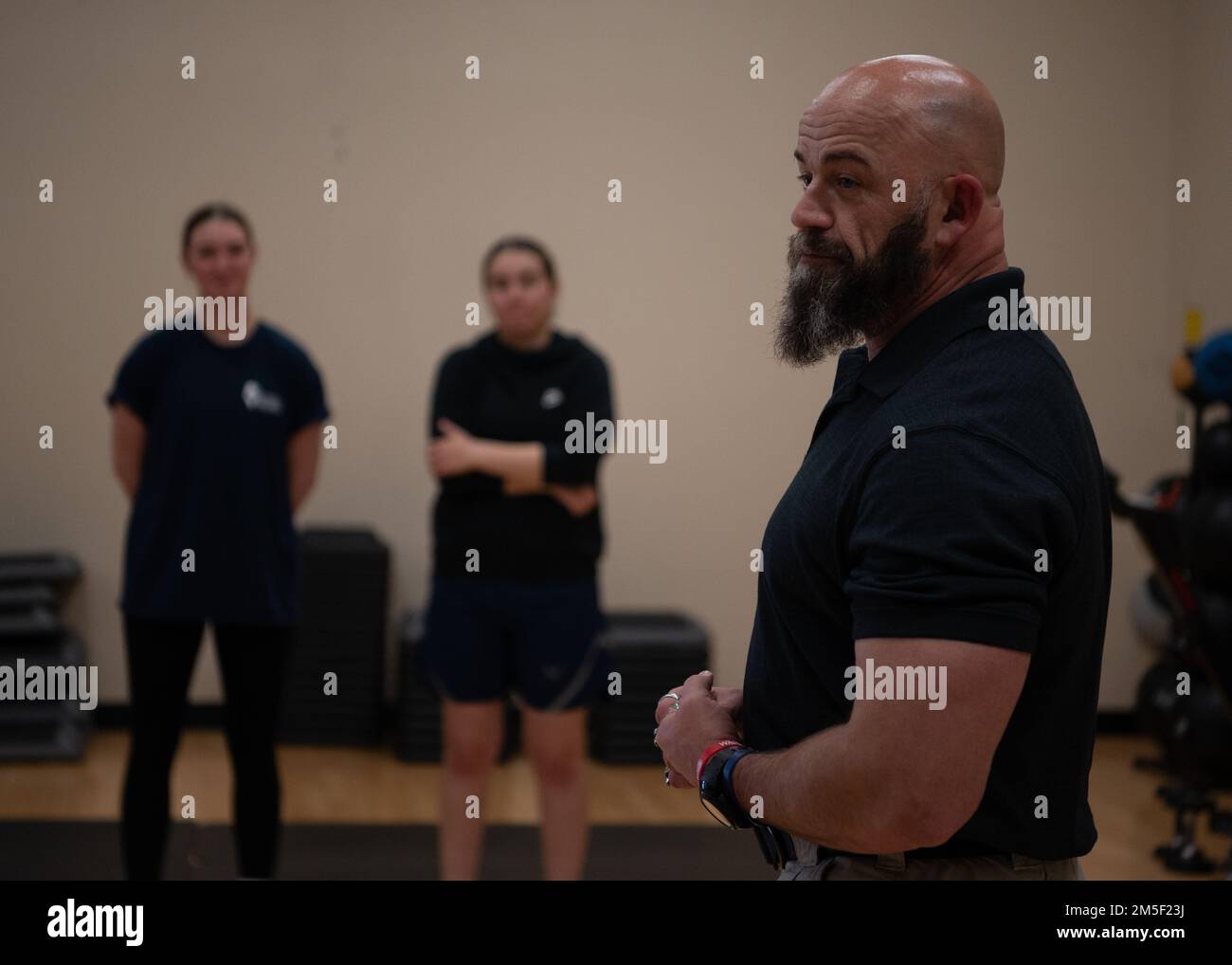 Billy Matheny, a 509th Security Forces Squadron training instructor, speaks during a women’s self-defense class last month at Whiteman Air Force Base, Missouri. At the end of the class Matheny answered questions about defending yourself with or against weapons and how to incapacitate an attacker. Stock Photo