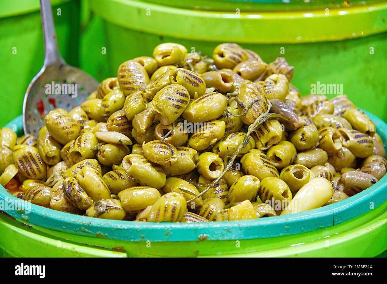 Green olives as local product to sell on the market counter Stock Photo