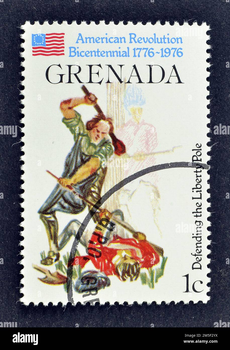 Cancelled postage stamp printed by Grenada, that shows Defense of Liberty Pole, Bicentennial of American Revolution, circa 1976. Stock Photo