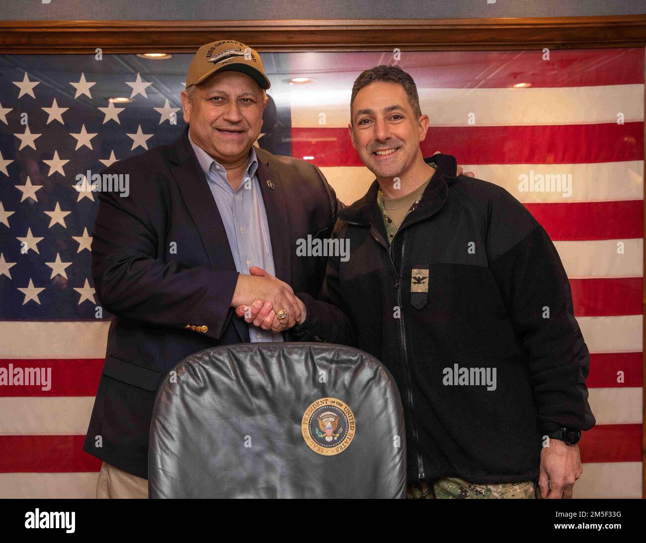 Secretary of the Navy Carlos Del Toro and Capt. Paul Lanzilotta, USS ...