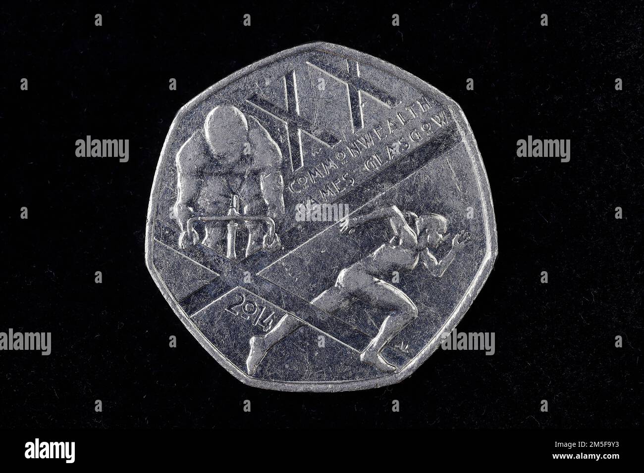 A 2014 50p coin to commemorate the Commonwealth Games being held in Glasgow. Stock Photo