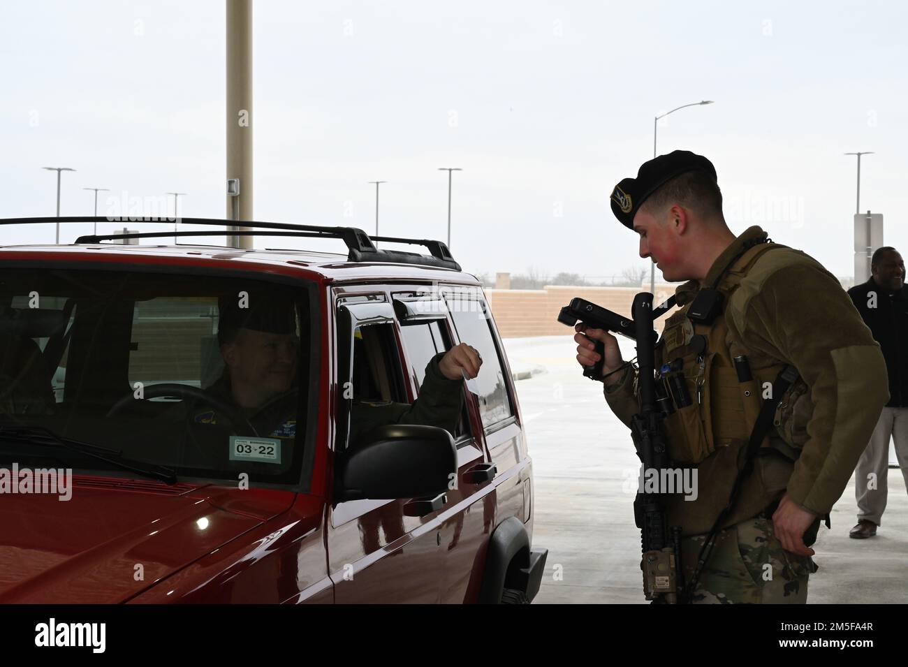 U.S. Air Force Col. Craig Prather, 47th Flying Training Wing commander, and CMSgt. David Snarr, 47th Flying Training Wing command chief, are the first to drive through the newly-updated West Gate checkpoint. The West Gate at Laughlin AFB received multiple structural improvements, including new driving lanes, an awning and an updated Security Forces checkpoint building. Stock Photo