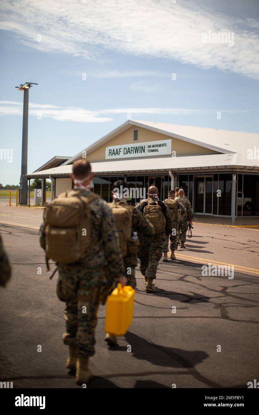 U.S. Marines with the Command Element, 5th Marine Regiment, Marine Rotational Force Darwin (MRF-D) 22 enter Royal Australian Air Force Base Darwin, NT, Australia, March 12, 2022. MRF-D 22 is a six month rotation where U.S. Marines, the Australian Defence Force, and other allied and partner nations enhance their interoperability and readiness posture in the Indo-Pacific region. Stock Photo