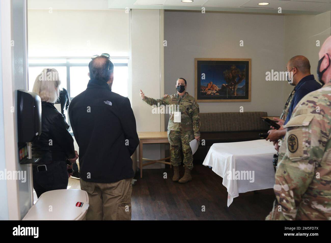 Col. Nancy Parson (center), the Weed Army Community Hospital commander, gives a tour of the hospital to local medical executives March 11, during the hospital’s Leadership Summit at Fort Irwin, Calif. (Photo by Kimberly Hackbarth/Weed ACH Public Affairs Office) Stock Photo