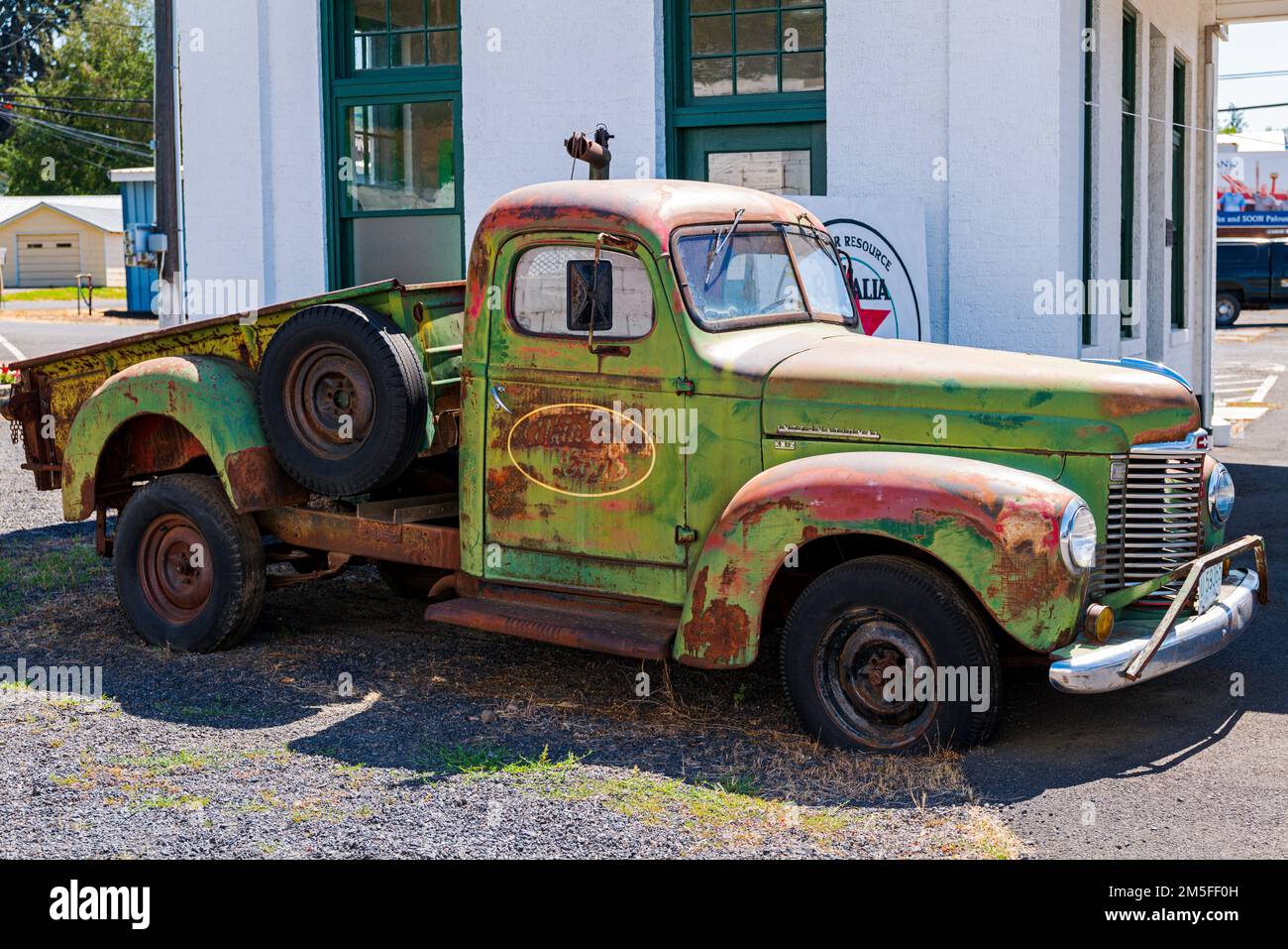 Antique International Harvester KB-2 pick-up truck; historic retro Texaco gas & motor oil station; Visitor's Center; Palouse region; Rosalia; Washingt Stock Photo