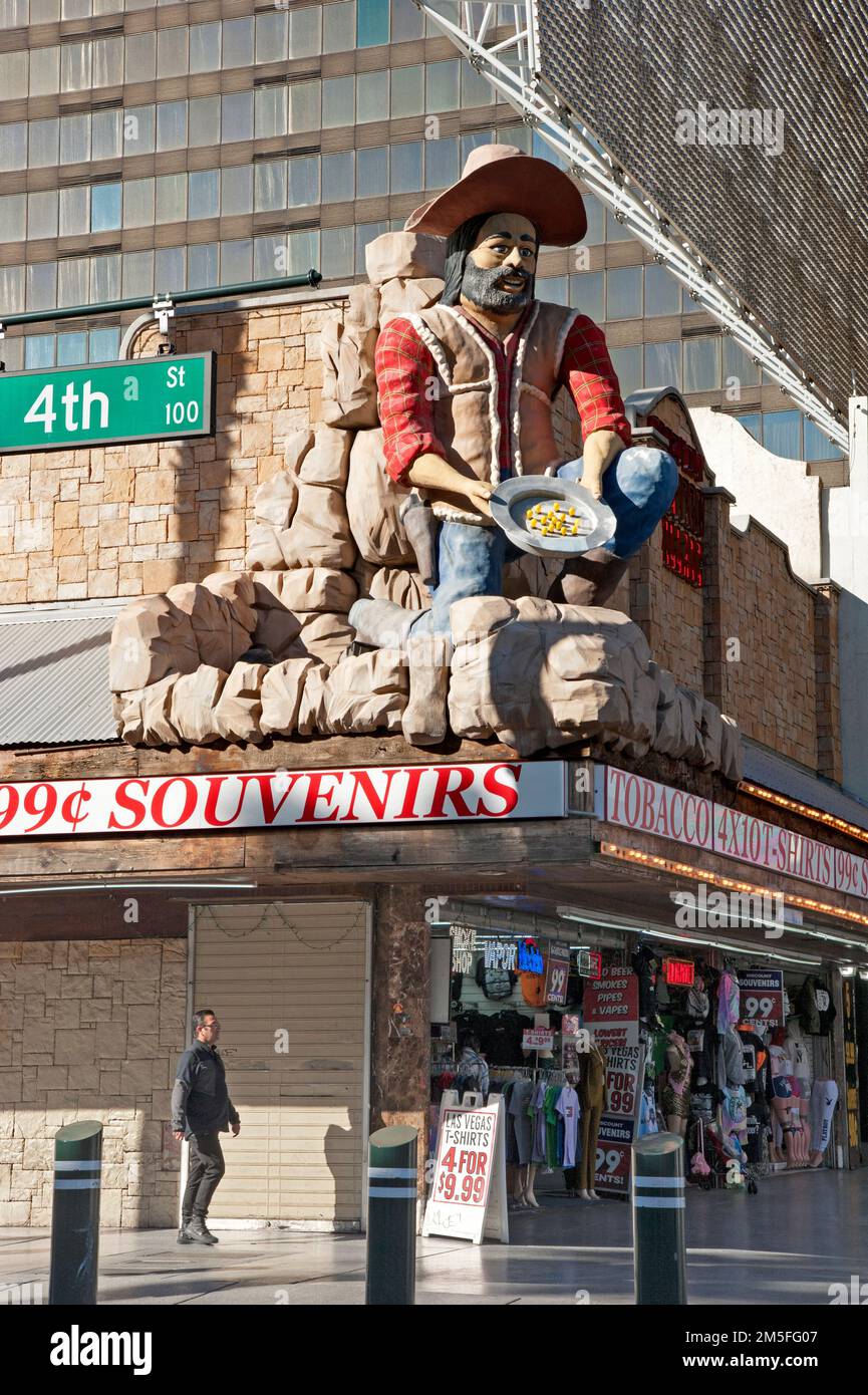 Vintage three-dimensional sign of a gold miner atop a souvenir shop on Fremont Street in Downtown, Las Vegas, Nevada Stock Photo